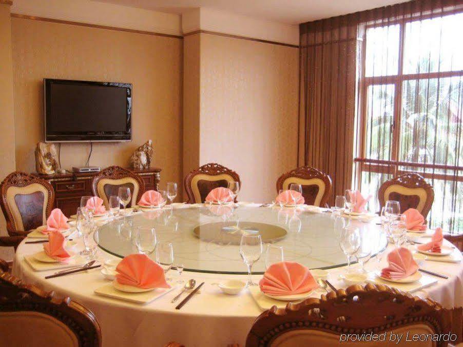 Golden Zone Hotel Jinghong Restaurant photo